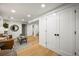 Finished basement with wood floors, recessed lights, and multiple entrances at 734 N Downing St, Denver, CO 80218