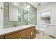 Bright bathroom featuring a double sink vanity, stylish fixtures, and eye-catching tile at 734 N Downing St, Denver, CO 80218