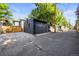 A detached garage is featured with a spacious driveway at 734 N Downing St, Denver, CO 80218