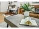 Well-decorated living area with modern furniture, plants, and plenty of light at 734 N Downing St, Denver, CO 80218