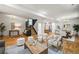 Open-concept living space with hardwood floors, comfortable seating, and access to the dining area at 734 N Downing St, Denver, CO 80218