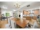 Bright and airy living room with hardwood floors and modern furnishings flowing into the kitchen at 734 N Downing St, Denver, CO 80218