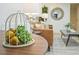 Stylish living space featuring a table with fruit and an artichoke, and a seating area at 734 N Downing St, Denver, CO 80218