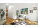 Cozy sunroom featuring hardwood floors, natural light, and stylish decor at 734 N Downing St, Denver, CO 80218