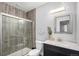 Bathroom featuring custom tile work in the glass door shower at 1222 S County Road 185, Byers, CO 80103