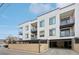 Modern apartment building with underground parking and balconies at 336 E 1St Ave # 207, Denver, CO 80203