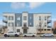 Three story building featuring modern architecture and street parking in front at 336 E 1St Ave # 207, Denver, CO 80203