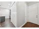 Spacious hallway featuring wood floors, closet space and neutral paint at 336 E 1St Ave # 207, Denver, CO 80203