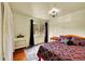 Bedroom with hardwood floors and a window with black out curtains at 810 Miner St, Idaho Springs, CO 80452