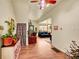 Stylish living room with hardwood floors, plants, and a cozy sofa by the window at 810 Miner St, Idaho Springs, CO 80452