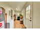 Mudroom featuring wood floors and access to the backyard at 810 Miner St, Idaho Springs, CO 80452