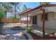 The backyard patio includes flower beds and convenient access to the home's sliding glass door at 12378 E Cedar Cir, Aurora, CO 80012