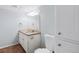 Bathroom featuring a granite countertop vanity and built-in storage at 12378 E Cedar Cir, Aurora, CO 80012