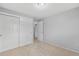 Bedroom with closet and light walls creates a serene and inviting space at 12378 E Cedar Cir, Aurora, CO 80012