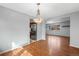 Bright dining area with hardwood floors and access to the kitchen at 12378 E Cedar Cir, Aurora, CO 80012