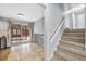 Living room features a sliding door to the backyard and a staircase at 12378 E Cedar Cir, Aurora, CO 80012