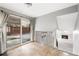 Living room features a sliding door to the backyard and a fireplace at 12378 E Cedar Cir, Aurora, CO 80012