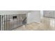 Staircase with carpet and black iron railings at 12378 E Cedar Cir, Aurora, CO 80012