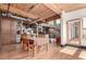 Bright dining room featuring wood floors and ceiling plus a view of the main floor of this loft at 1745 Wazee St # 5E, Denver, CO 80202