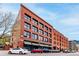 Stunning brick building with large windows and street parking in an urban area at 1745 Wazee St # 5E, Denver, CO 80202