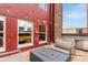 Charming rooftop patio with comfortable seating and a partial outdoor kitchen at 1745 Wazee St # 5E, Denver, CO 80202