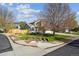 Charming two-story home with a well-maintained front yard, mature trees, and beautiful landscaping at 12705 Home Farm Dr, Westminster, CO 80234