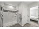 Modern bathroom featuring a glass-enclosed shower with stylish tile accents at 6566 S Telluride St, Aurora, CO 80016