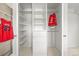 Bright closet featuring built-in storage and organizational solutions to optimize space at 6566 S Telluride St, Aurora, CO 80016