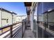 Balcony with metal railings, providing an outdoor space to enjoy the neighborhood views at 2650 Front View # 205, Denver, CO 80211