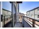 Balcony with metal railings, offering an outdoor space with views of the surrounding neighborhood at 2650 Front View # 205, Denver, CO 80211