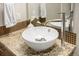 Close-up of a modern vessel sink, granite countertops and a stylish faucet in a bathroom at 2650 Front View # 205, Denver, CO 80211