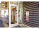 Building entrance with security features, sleek design, and glass doors at 2650 Front View # 205, Denver, CO 80211
