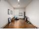 Bright home gym featuring wood floors, fitness equipment and natural light from a window at 2650 Front View # 205, Denver, CO 80211