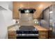 Kitchen with stove and stainless appliances at 2650 Front View # 205, Denver, CO 80211