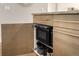 Kitchen cabinet with built in microwave at 2650 Front View # 205, Denver, CO 80211