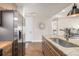 Modern kitchen featuring stainless steel appliances and granite countertops at 2650 Front View # 205, Denver, CO 80211