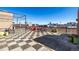 Shared rooftop deck with picnic tables, chairs, and city views, a lovely outdoor area at 2650 Front View # 205, Denver, CO 80211