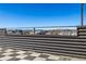 Rooftop deck with checkerboard flooring, metal walls, and mountain views at 2650 Front View # 205, Denver, CO 80211