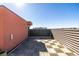 Private rooftop deck with checkerboard flooring and partial city views, a great outdoor space at 2650 Front View # 205, Denver, CO 80211