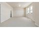 Spacious bedroom with plush carpeting, natural light, and an attached bathroom at 2877 E 103Rd Dr, Thornton, CO 80229