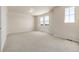 A bright bedroom with large windows that allow in ample natural light, creating a warm and inviting space at 2877 E 103Rd Dr, Thornton, CO 80229