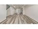 View of living space, stairs, and kitchen with an island and pendant lighting at 2877 E 103Rd Dr, Thornton, CO 80229