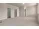 A spacious main bedroom featuring doors to the ensuite bathroom and walk-in closet, for convenience and privacy at 2877 E 103Rd Dr, Thornton, CO 80229