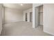 Spacious main bedroom with doors to the ensuite bathroom and walk-in closet, providing a private retreat for relaxation at 2877 E 103Rd Dr, Thornton, CO 80229
