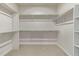 Bright and spacious walk-in closet, providing ample room for clothing and accessories, for organization and convenience at 2877 E 103Rd Dr, Thornton, CO 80229