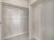 Spacious walk-in closet with ample shelving and neutral carpeting at 2877 E 103Rd Dr, Thornton, CO 80229