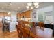 Dining room with hardwood floors and natural light at 15046 Verbena St, Thornton, CO 80602
