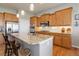 Well-equipped kitchen showcases granite countertops and stainless appliances at 15046 Verbena St, Thornton, CO 80602