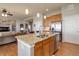 Kitchen island features granite countertop and stainless steel dishwasher at 15046 Verbena St, Thornton, CO 80602