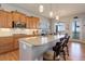 Updated kitchen boasts granite countertops and modern appliances at 15046 Verbena St, Thornton, CO 80602